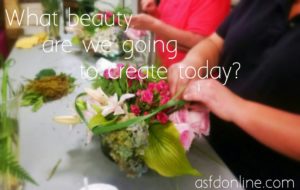 Designer creating a flower arrangement